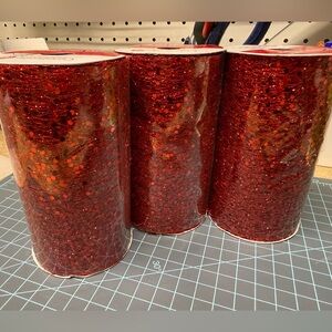 NWT. Set of 3 rolls of extra wide red ribbon with glittery sequins, new unopened